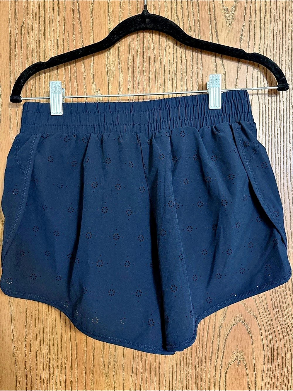 blue athletic shorts with design